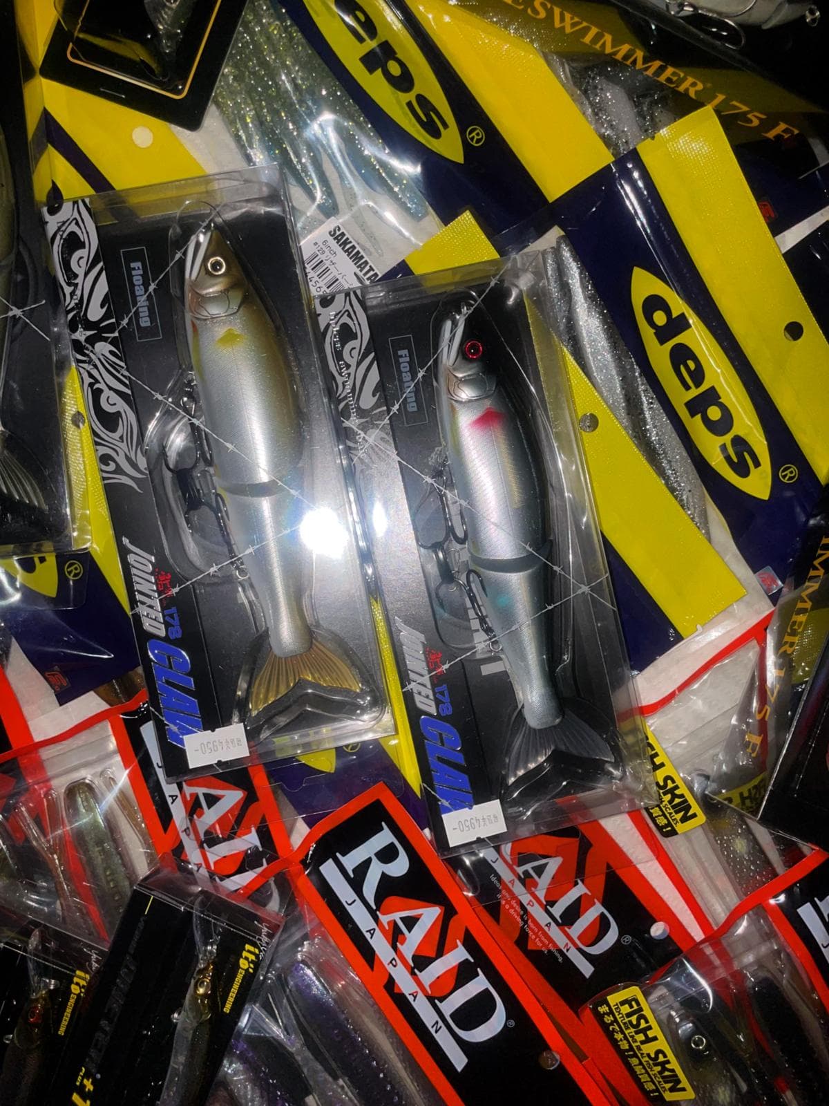 JDM kunstaas voorraad van Hooked Japan: Deps Jointed Claw, Slide Swimmer en Raid Japan
